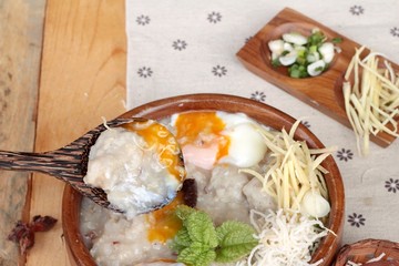 Brown rice porridge put pork and soft-boiled egg of delicious.