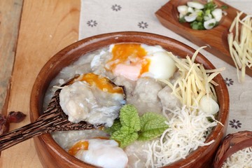 Brown rice porridge put pork and soft-boiled egg of delicious.