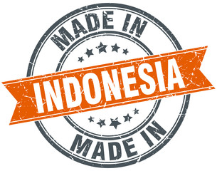 Indonesia orange grunge ribbon stamp on white