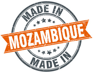 Mozambique orange grunge ribbon stamp on white