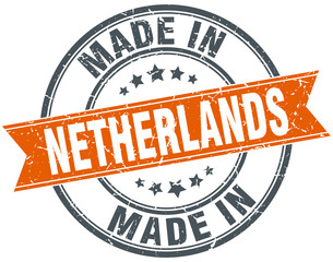 Netherlands orange grunge ribbon stamp on white