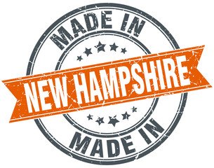 New Hampshire orange grunge ribbon stamp on white