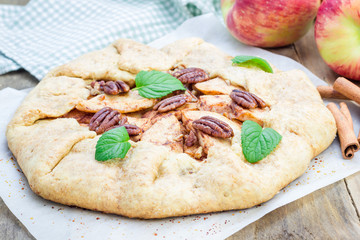 Homemade fresh apple galette with pecan nuts