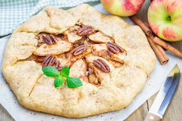 Homemade fresh apple galette with pecan nuts