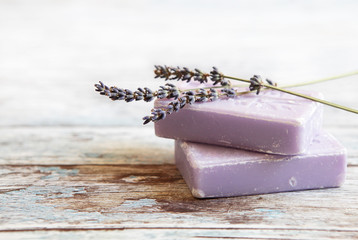  lavender soap  on rustic wooden board - obrazy, fototapety, plakaty