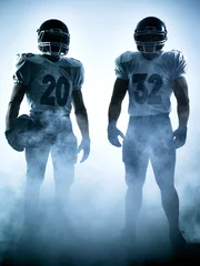 Fotobehang american football players silhouette © snaptitude
