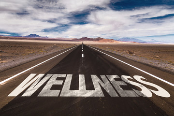 Wellness written on desert road