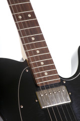 Fototapeta na wymiar black electric guitar on a white background