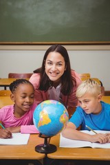 Fototapeta premium Teacher sitting with her students