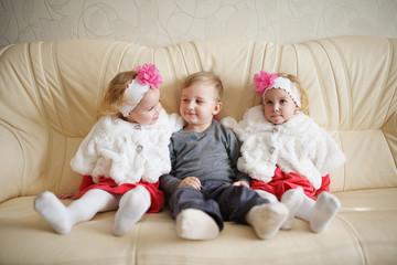 boy with two girls twins