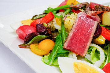 Tuna Nicoise Salad selective focus on tuna