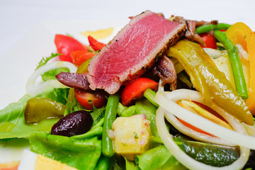 Tuna Nicoise Salad selective focus on tuna