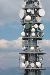 Detail of a crowded communication repeater antenna tower