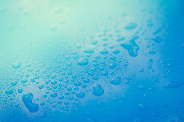 Drops of water on blue floor