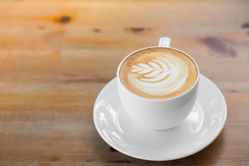 Latte Coffee art on the wooden table
