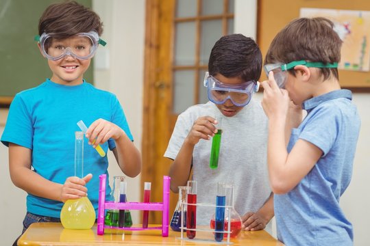Pupils at science lesson in classroom