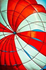 open parachute in the blue sky