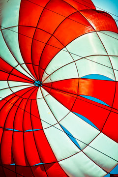 open parachute in the blue sky