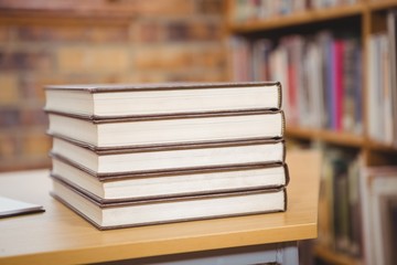 Four books on the desk