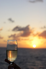 Sunset toast at sea.