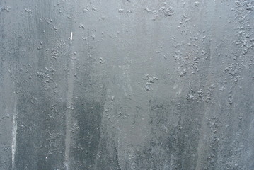 Grungy old black metal texture with rough surface; can serve as background.