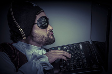 Violation, computer security, hacker pirate dress with hat and s