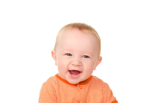 portrait of laughing funny baby boy