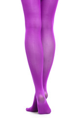 Woman slim legs and violet stockings isolated