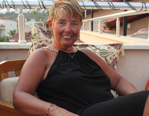 Fototapeta premium An english lady relaxing while on vacation