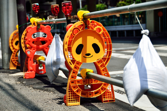 Panda-shaped post of barricade at construction site, Japan