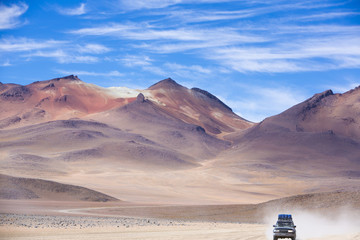 Off-road vehicle driving in the Atacama desert, Bolivia