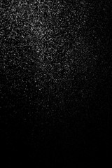 Drops of water on a black background. Texture.