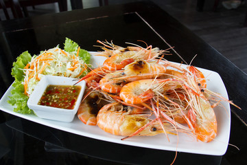 Shrimps freshwater grilled on plate  with seafood sauce.
