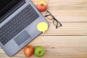 Creative professional's work table and tech gadgets from above