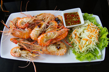 Shrimps freshwater grilled on plate  with seafood sauce.