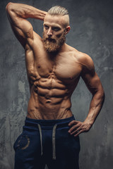Fototapeta na wymiar Shirtless bodybuilder with beard.