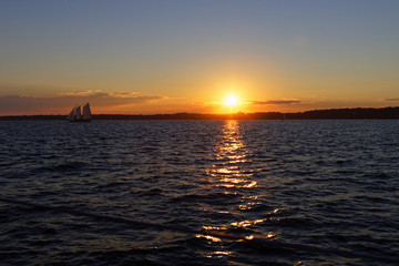 Fototapeta na wymiar Sail boat at sunset.