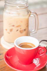 Hot and cold coffee on wooden table