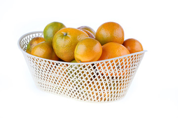 orange fruit in basket, isolated on white background