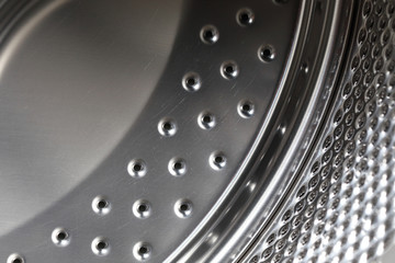 closeup image of washing machine, abstract metallic texture