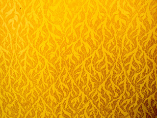Close Up of gold fabric delicate at stripe pattern background.