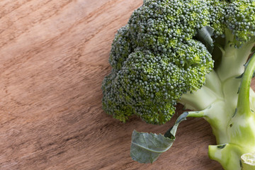 green broccoli organic vegetable on wood board prepared cooking