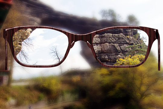 Glasses against natural scenery