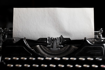 typewriter with paper sheet. Space for your text - Powered by Adobe