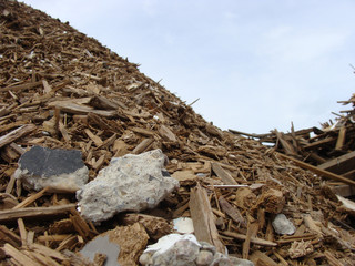 detail of a wood rubble pile on a demolition site