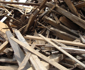 large stack of wood on a demolition site