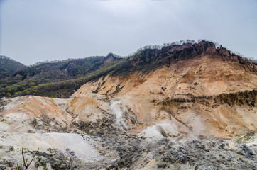 Obraz premium Jigokudani hell valley walking trail in Noboribetsu, Hokkaido, Japan