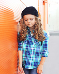 Fashion kid concept - portrait of stylish little girl child wear