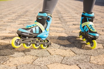 Close up view of woman wearing inline skates