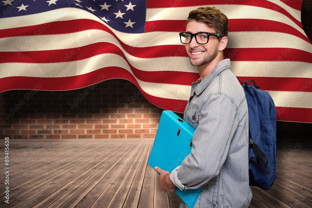 Poster composite image of student smiling at camera in library